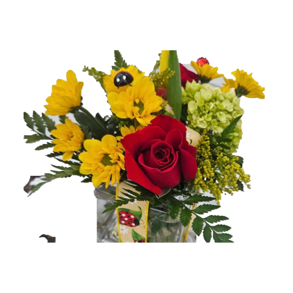 Small arrangement of yellow flowers, a red rose, and green blooms in a glass vase with ladybug accents