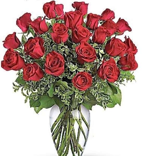 Arrangement of red roses in a clear glass vase