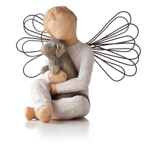Figurine of an angel holding a dog