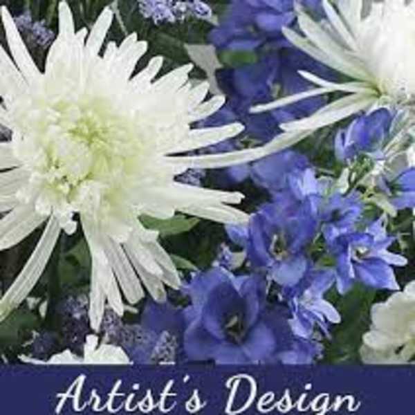 White and blue flower arrangement with large daisy-like blooms