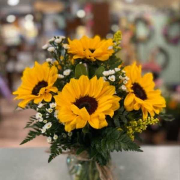 Sunflower bouquet in a clear glass vase