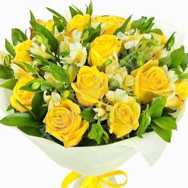 Yellow roses and white flowers in a wrapped bouquet