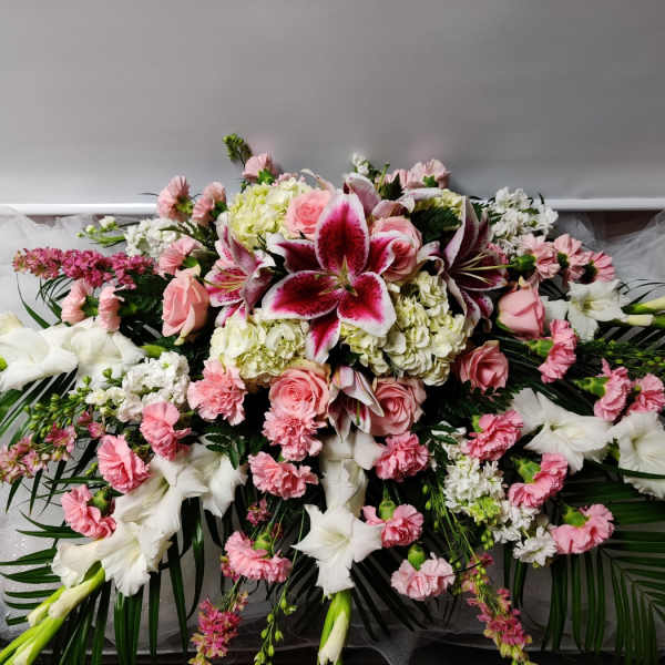 Large pink and white floral spray with lilies and roses