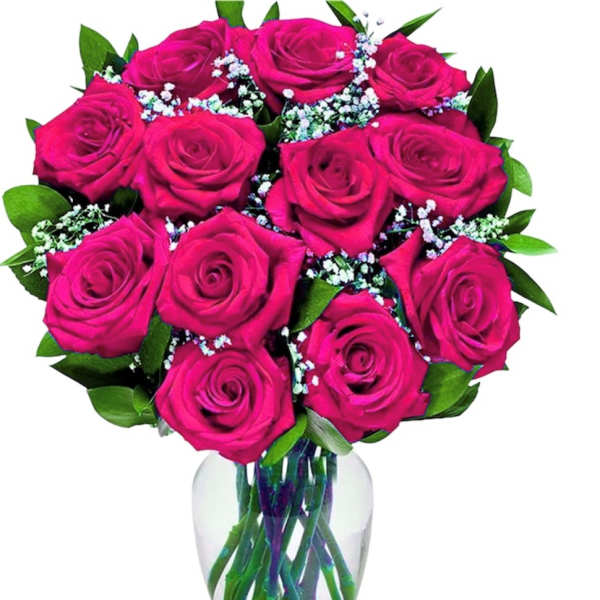 Bouquet of bright pink roses in a clear glass vase