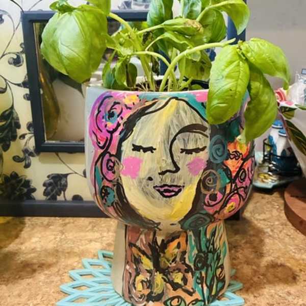 Custom painted face vace pots each one is uniquely painted