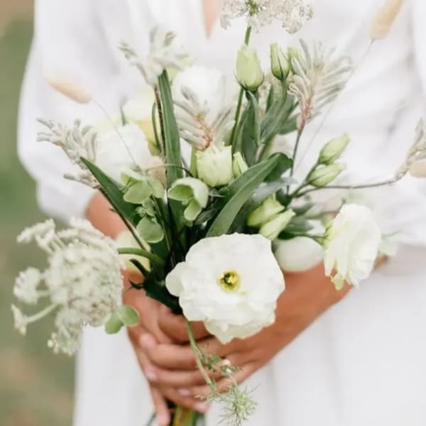 White bouquet with green buds and airy filler flowers