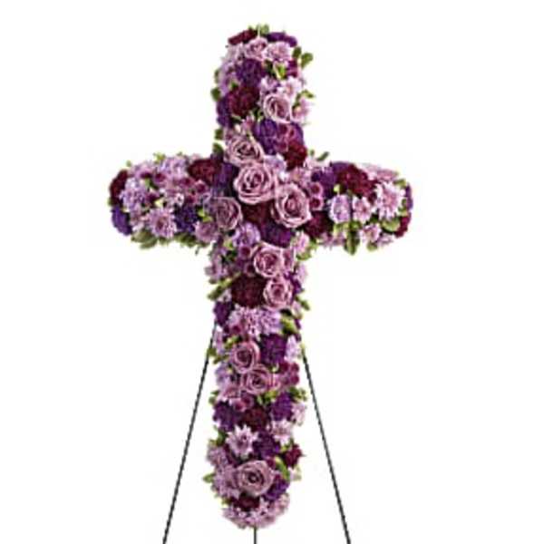 Purple floral cross on a stand