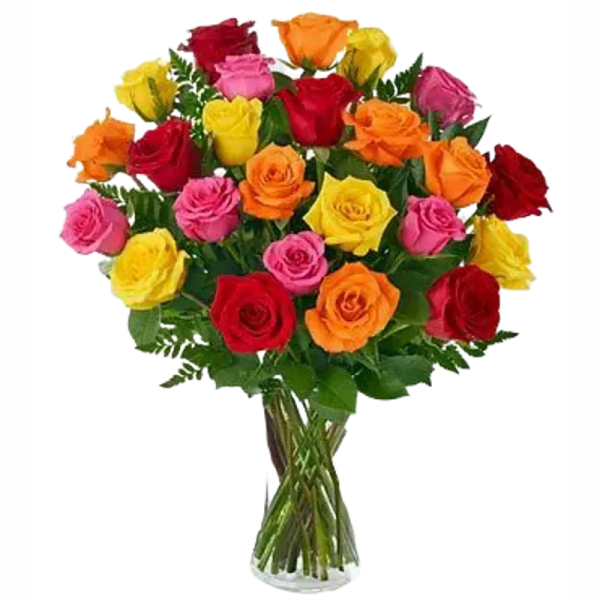 Bouquet of multicolored roses in a clear glass vase