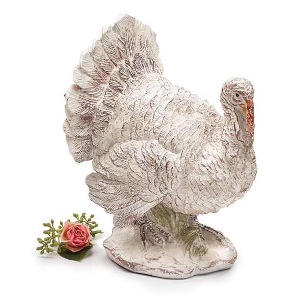 Decorative turkey figurine with a small pink rose accent