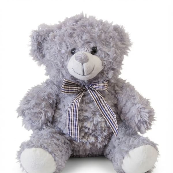 Lavender plush teddy bear with a plaid ribbon bow