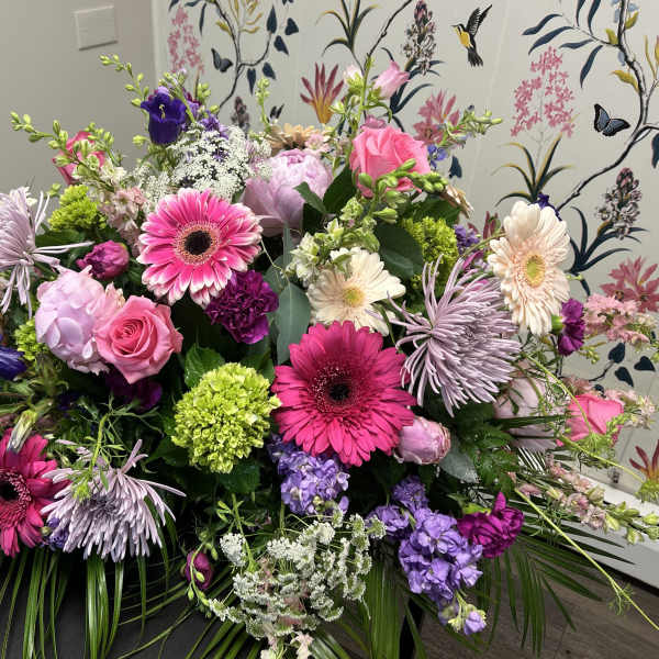 Large mixed bouquet with pink, purple, and white flowers