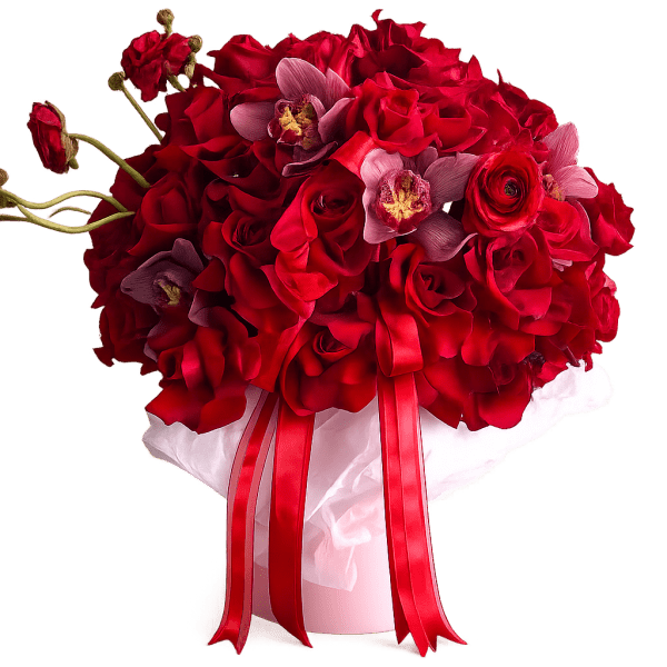 Red rose bouquet with pink orchids in a white box and red ribbon