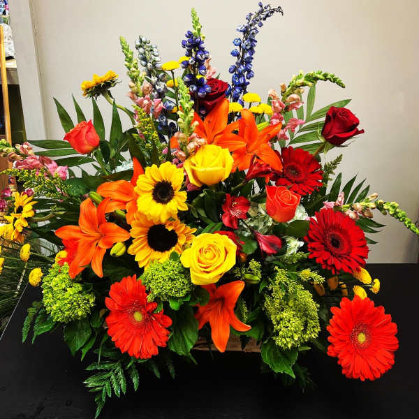 Bright mixed bouquet with roses, lilies, gerbera daisies, and snapdragons