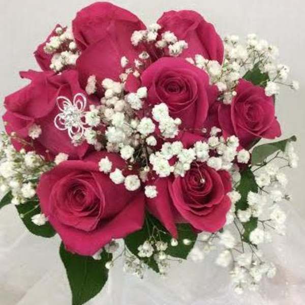 Bouquet of hot pink roses with white baby's breath