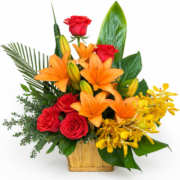 Basket arrangement of red roses, orange lilies, and yellow orchids