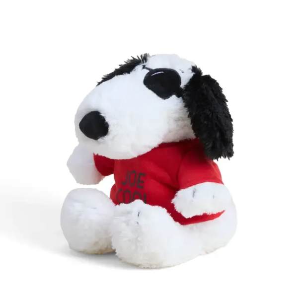 Plush Snoopy toy wearing a red shirt