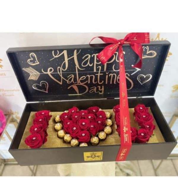 Heart-shaped rose gift box with chocolates and a Valentine’s Day message