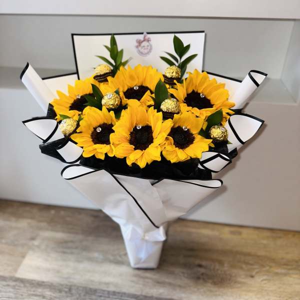 BEAUTIFUL ARRANGEMENT OF SUNFLOWERS AND CHOCOLATES