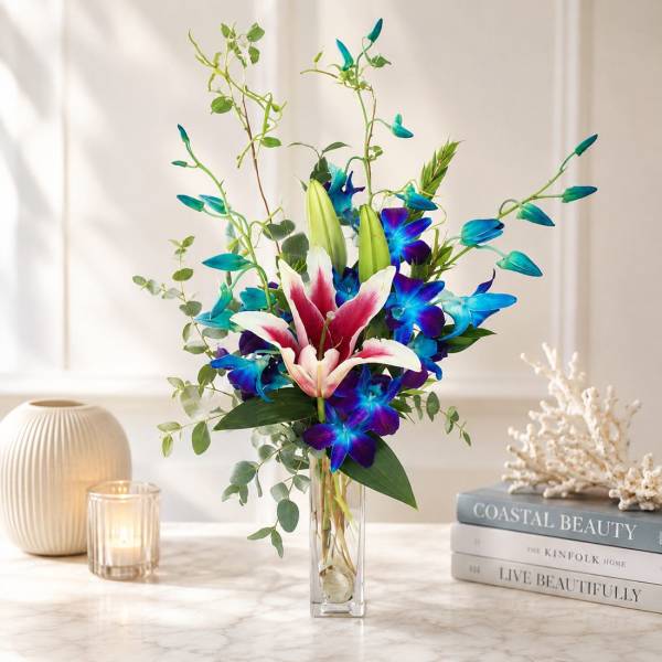 Blue Orchids and Stargazer Lily Vase