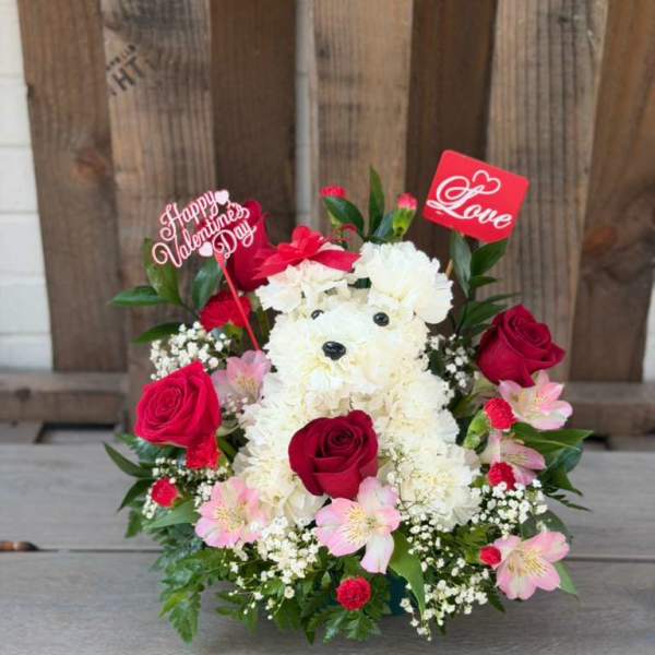 White teddy bear floral arrangement with red roses and pink flowers