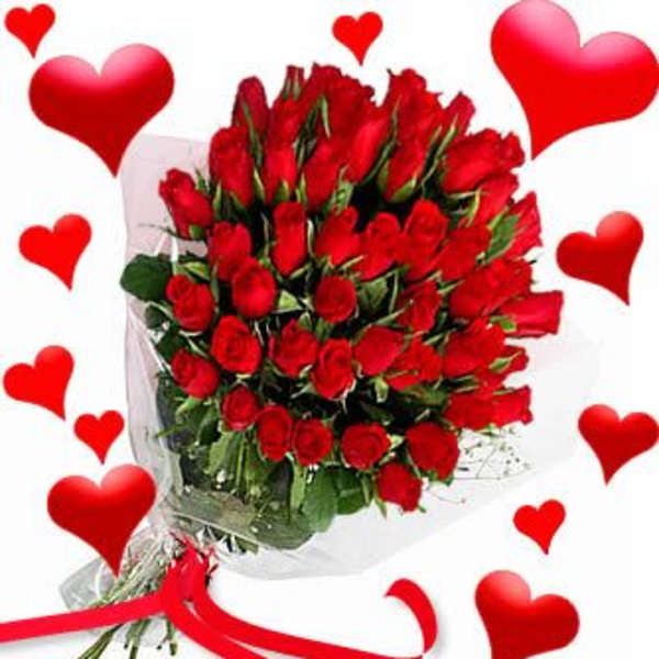 Bouquet of red roses wrapped in clear plastic with red heart graphics