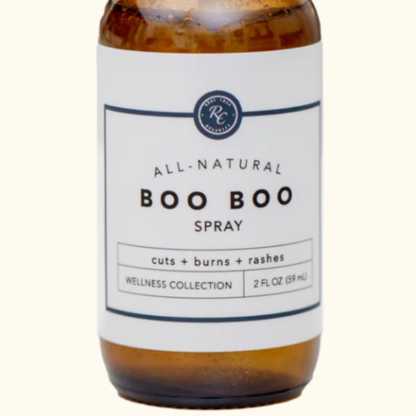 Amber spray bottle labeled Boo Boo Spray