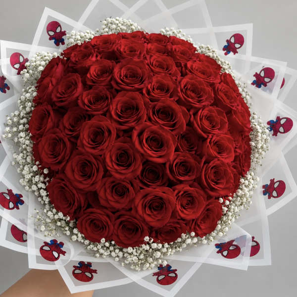 Large bouquet of red roses with white baby's breath and Spider-Man wraps