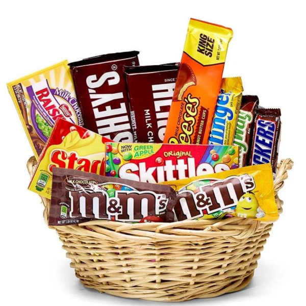 Basket filled with assorted candy bars and sweets