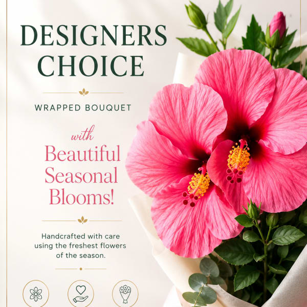 Wrapped bouquet of bright pink hibiscus flowers with green foliage