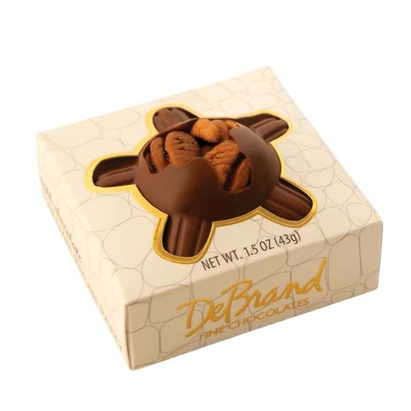 Box of chocolate-covered nuts in cream-colored packaging