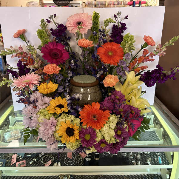 Colorful mixed flower arrangement with gerbera daisies and lilies