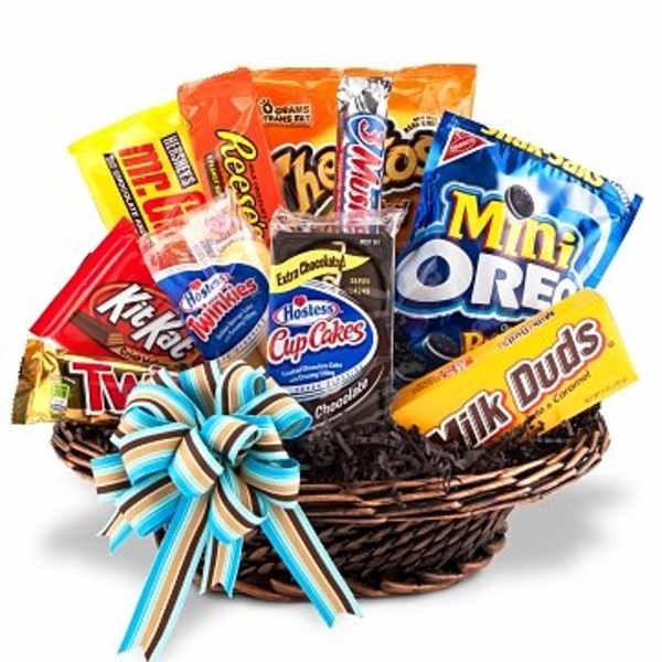 Basket of assorted candy bars with a striped ribbon bow
