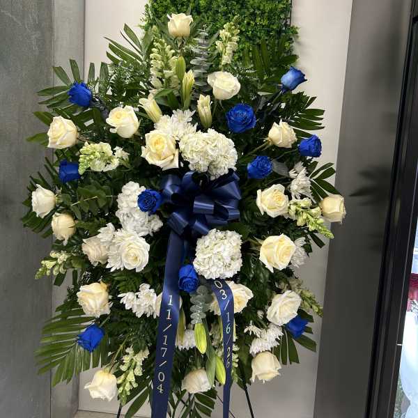Blue funeral spray