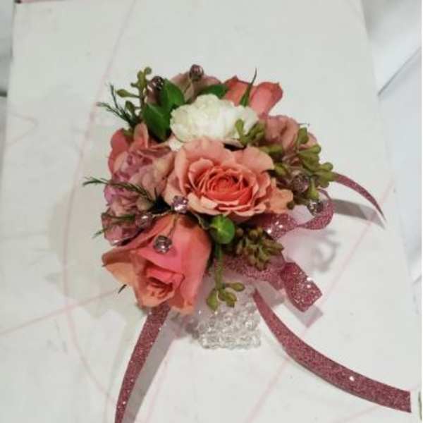 Pink and white rose boutonniere with glitter ribbon