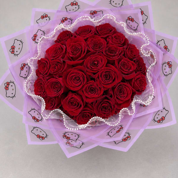 Bouquet of red roses wrapped in lavender Hello Kitty paper