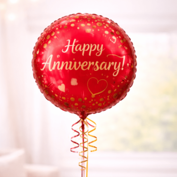 Red anniversary balloon with gold confetti and ribbon curls