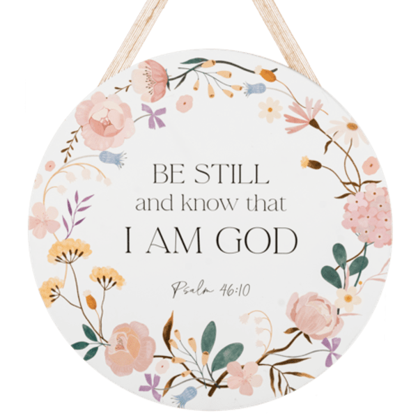 Round floral wall sign with Bible verse and hanging ribbon