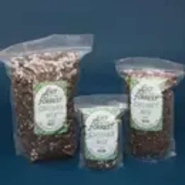 Three clear bags of dried flower petals on a blue background