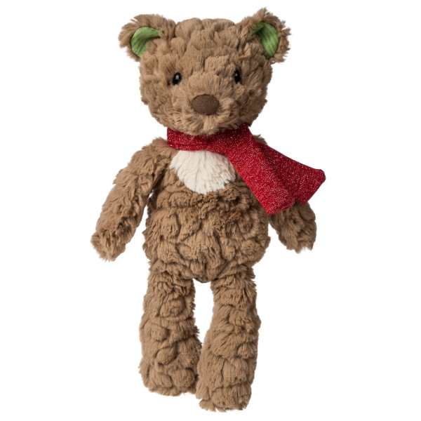 Brown teddy bear with a red scarf on a white background
