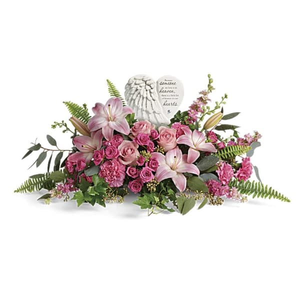 Pink lily and rose sympathy arrangement with a memorial angel plaque