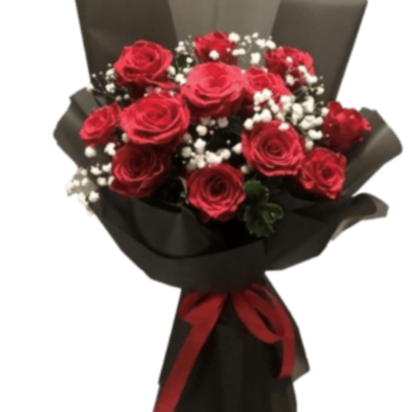Bouquet of red roses with white baby's breath wrapped in black paper