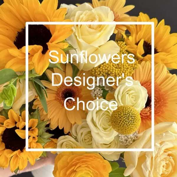 Bouquet of yellow sunflowers and cream roses