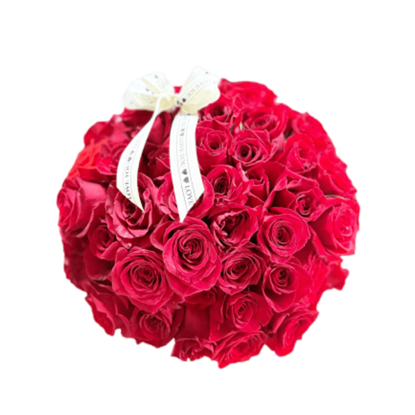Round bouquet of red roses with a white ribbon bow