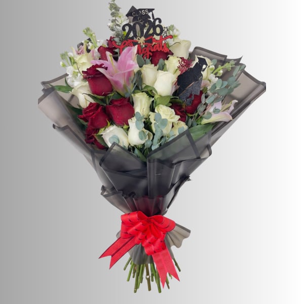 Bouquet of red and white roses with lilies, wrapped in black paper and tied with a red ribbon