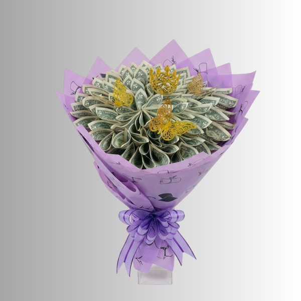 Bouquet made of folded dollar bills with purple wrapping and ribbon