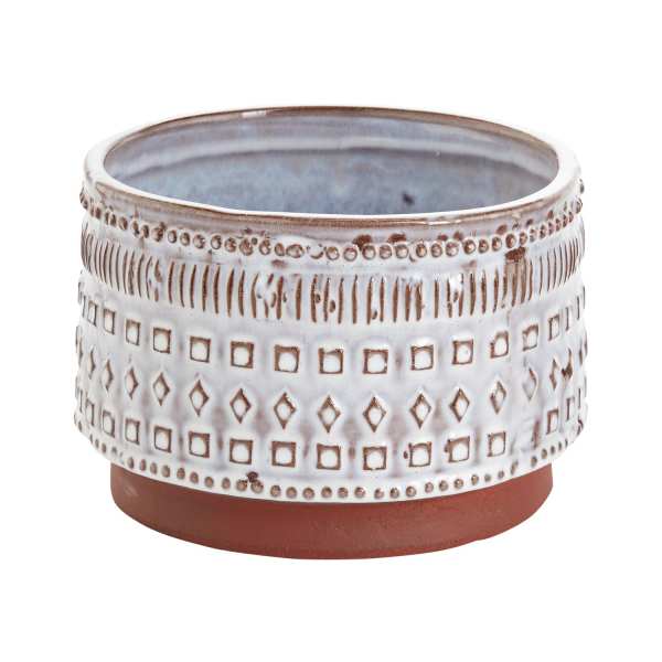 Decorative ceramic planter with a white patterned glaze and brown base