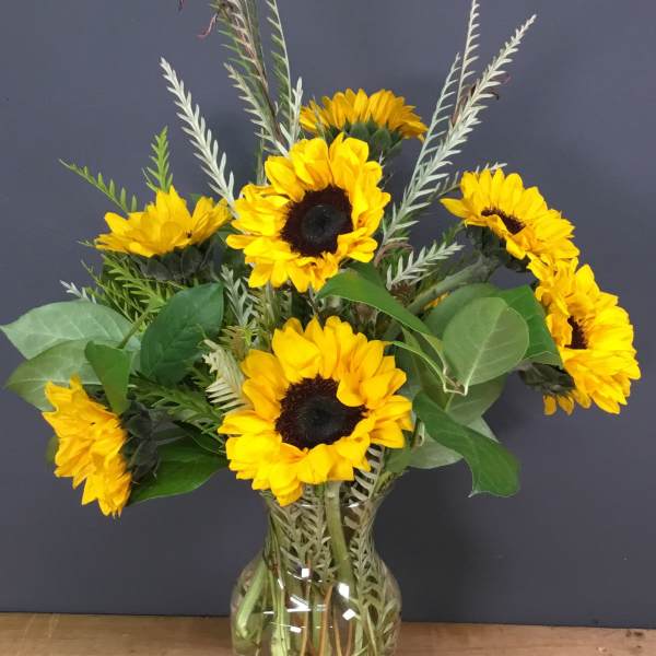 Sunflower bouquet in a clear glass vase