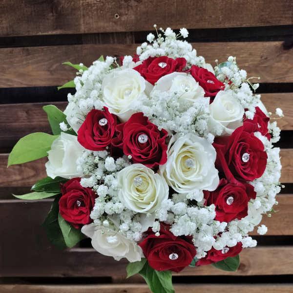Bouquet of red and white roses with baby's breath
