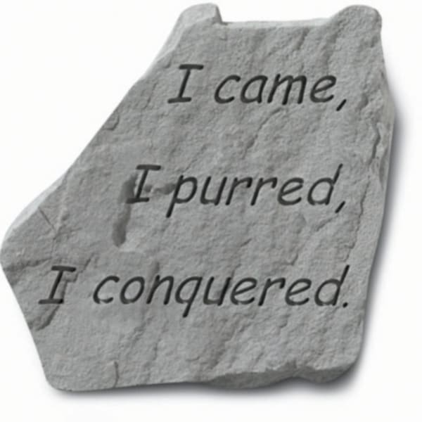 Gray stone with the words "I came, I purred, I conquered."