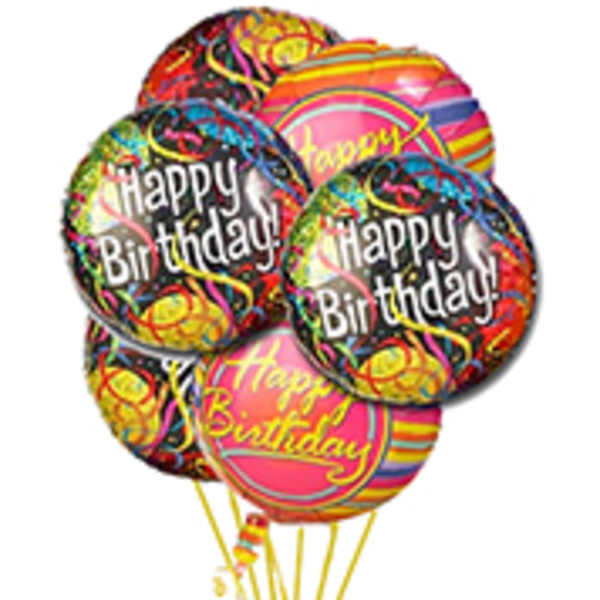 Cluster of colorful birthday balloons with printed messages
